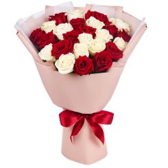 Red and white roses in the bouquet 