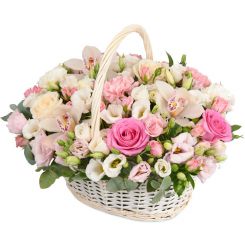 Roses, lisianthus, orchids bouquet in a basket 